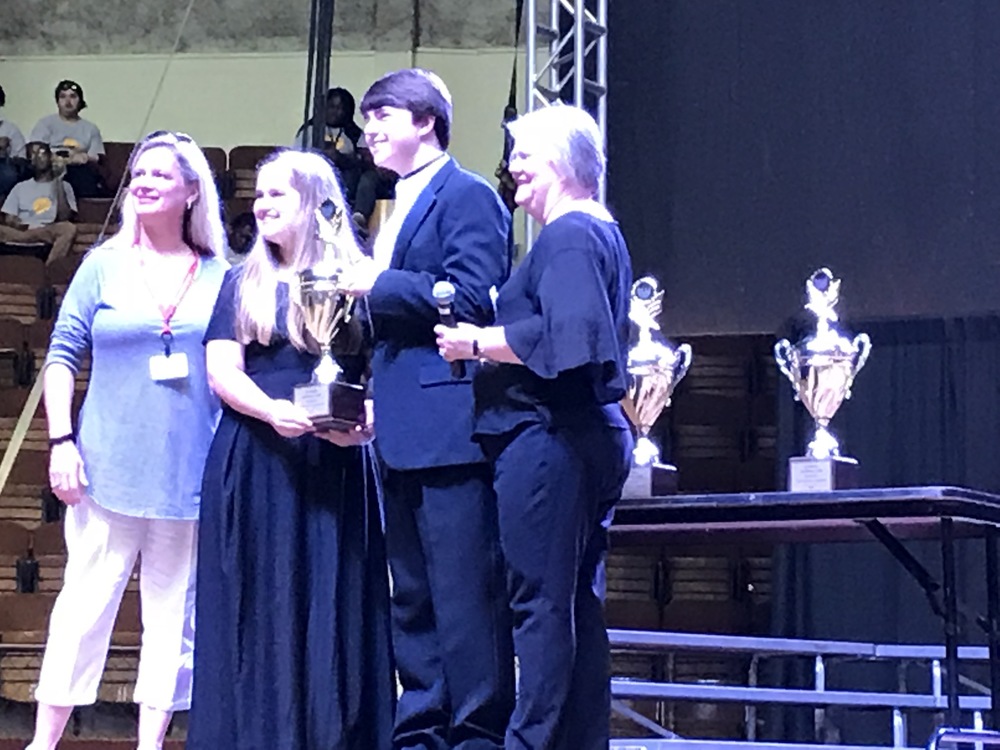 Choirs and Bands score Superior in all contests